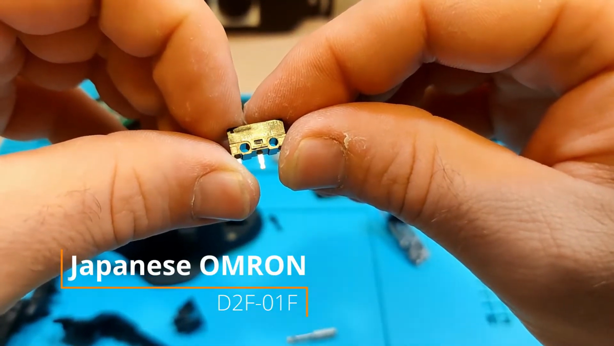Close-up of a Japanese OMRON D2F-01F micro switch
